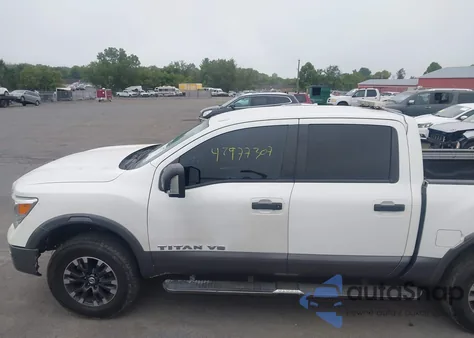 2019 Nissan Titan Pro-4X из США, поврежденный, VIN 1N6AA1E57KN504186